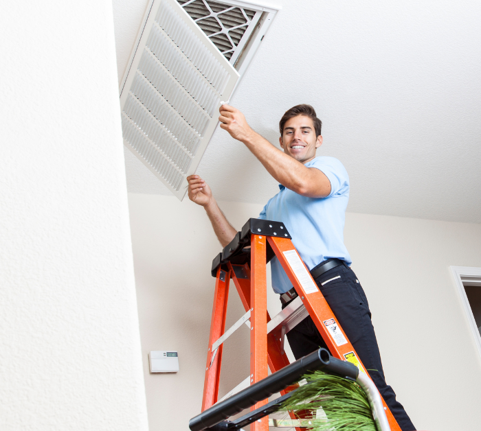 Bright Air Duct Cleaning team working on HVAC system in Mango, FL