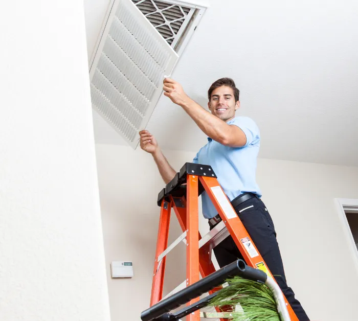 Bright Air Duct Cleaning team working on HVAC system in Mango, FL