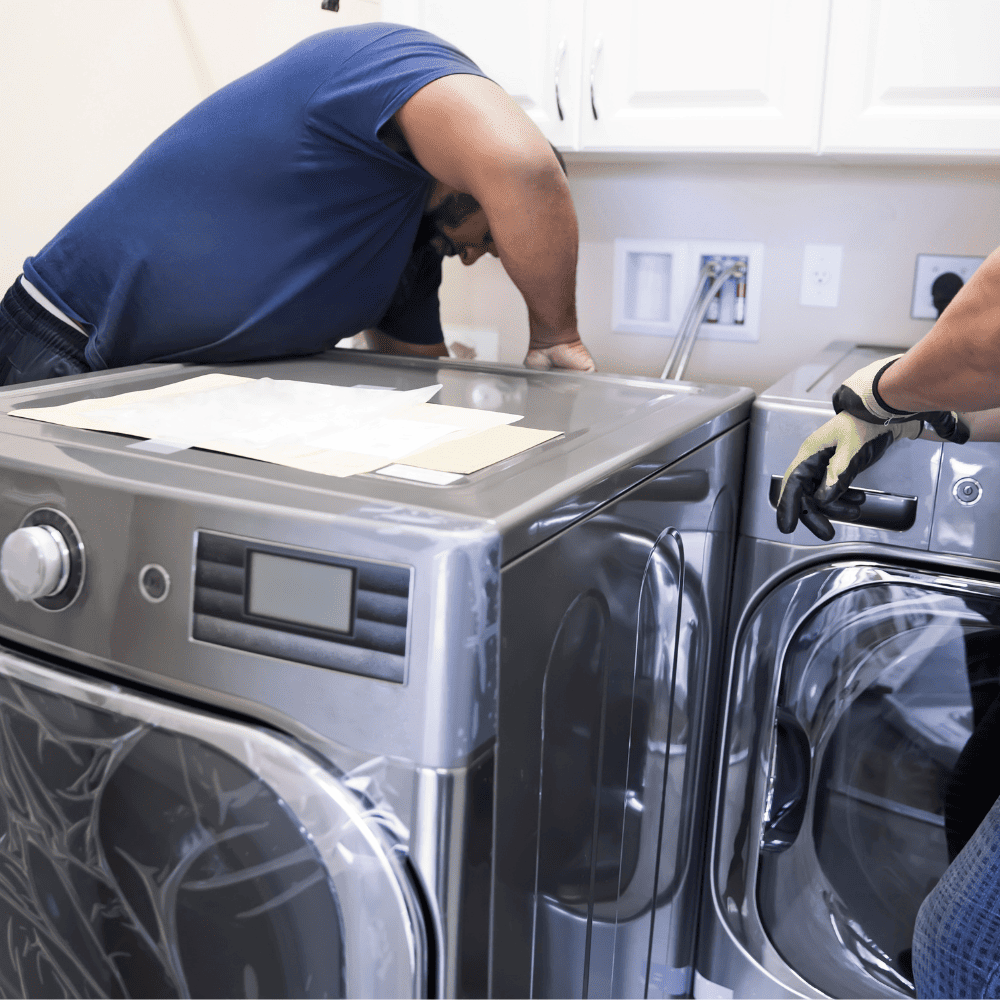 Technician performing dryer vent installation in Tampa