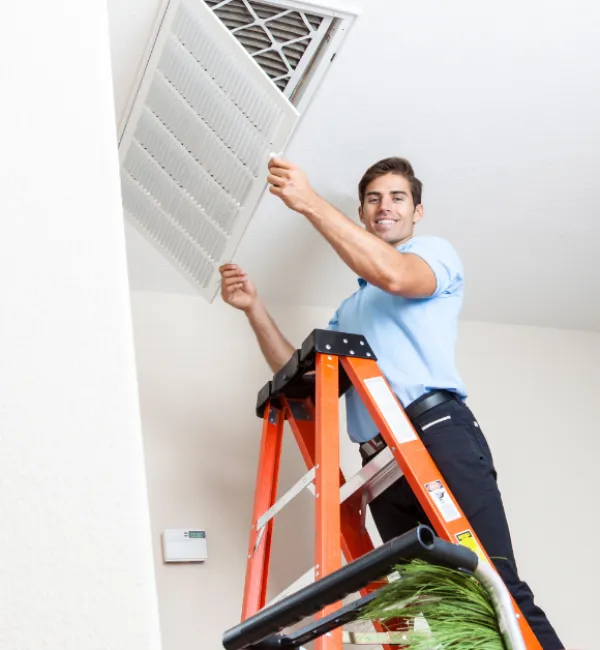 Bright Air Duct Cleaning team working on HVAC system in Mango, FL